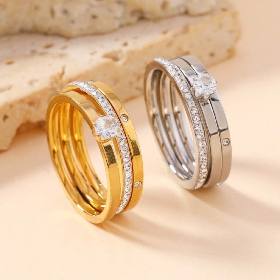 BLOSSOM Conjunto de três anéis de aço inoxidável com diamante